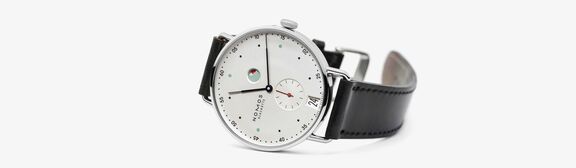 nomos-glashuette-1101-metro-datum-gangreserve-uhr-juwelierlauferminden